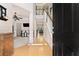 Inviting foyer with hardwood floors, high ceilings, and views into the adjacent rooms at 525 Roland Manor Dr, Dacula, GA 30019