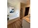 Bathroom features a bathtub with tile surround, granite countertops and a glass-enclosed shower at 1569 Aiden Way # 35, Conyers, GA 30013