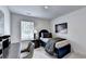 Bedroom featuring a desk and a painting of a British phone booth at 1569 Aiden Way # 35, Conyers, GA 30013