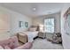 Cozy bedroom with a twin bed and a cute teddy bear by the window at 1569 Aiden Way # 35, Conyers, GA 30013