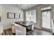 Cozy dining area with modern table, chairs, art, and natural light at 1569 Aiden Way # 35, Conyers, GA 30013