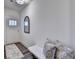 Bright entryway featuring a front door, stylish mirror, and a comfortable bench seating at 1569 Aiden Way # 35, Conyers, GA 30013