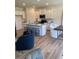 Stylish kitchen with stainless steel appliances, granite countertops, an island with seating, and an open layout at 1569 Aiden Way # 35, Conyers, GA 30013