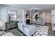 Comfortable living room with fireplace, gray furnishings, and wood-style flooring at 1569 Aiden Way # 35, Conyers, GA 30013