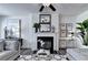 Cozy living room with fireplace, modern decor, plush seating, and stylish accents at 1569 Aiden Way # 35, Conyers, GA 30013