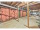 Unfinished basement with wood support beams and pink insulation at 1584 Allgood Ne Rd, Marietta, GA 30062