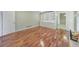 Spacious bedroom with built-in shelves and wood floors at 1584 Allgood Ne Rd, Marietta, GA 30062