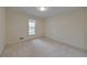 Sun-filled bedroom with carpet and a large window at 1584 Allgood Ne Rd, Marietta, GA 30062