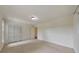A carpeted bedroom with closet doors and one window provides an inviting space at 1584 Allgood Ne Rd, Marietta, GA 30062