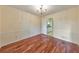 Bright dining room features hardwood floors, crown molding, and views to the kitchen at 1584 Allgood Ne Rd, Marietta, GA 30062