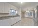 The kitchen offers white cabinets, stainless appliances, and neutral countertops at 1584 Allgood Ne Rd, Marietta, GA 30062