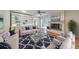 Inviting living room with built-in shelving, a cozy fireplace, and ample natural light at 1584 Allgood Ne Rd, Marietta, GA 30062