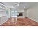 Hardwood living room with a sliding glass door and built in shelving at 1584 Allgood Ne Rd, Marietta, GA 30062