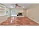 Large living room features a brick fireplace, hardwood floors, and sliding doors at 1584 Allgood Ne Rd, Marietta, GA 30062