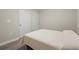 Neutral bedroom featuring modern flooring, neutral walls and trim and two doors at 3708 Ashford Creek Ne Hl # 3708, Atlanta, GA 30319