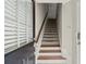 Inviting entryway with hardwood stairs and natural light at 3708 Ashford Creek Ne Hl # 3708, Atlanta, GA 30319