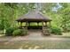 Charming gazebo nestled among lush trees, offering a peaceful retreat at 3708 Ashford Creek Ne Hl # 3708, Atlanta, GA 30319