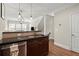 Stylish kitchen with stainless appliances and open layout to living spaces at 3708 Ashford Creek Ne Hl # 3708, Atlanta, GA 30319