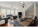 Living room view that includes a ceiling fan, hardwood floors and dining area at 3708 Ashford Creek Ne Hl # 3708, Atlanta, GA 30319