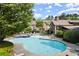 Large community pool with lounge chairs, hot tub, and nearby clubhouse at 3708 Ashford Creek Ne Hl # 3708, Atlanta, GA 30319
