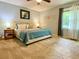 Cozy bedroom with carpet, a comfortable bed, and natural lighting at 5364 Muirwood Pl, Powder Springs, GA 30127