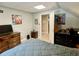 Bedroom featuring a sloped ceiling, art, and a traditional style dresser at 5364 Muirwood Pl, Powder Springs, GA 30127