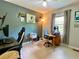 Comfortable bedroom featuring neutral paint and a ceiling fan, perfect for a home office at 5364 Muirwood Pl, Powder Springs, GA 30127