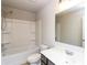 Bathroom featuring a tub and shower combo, toilet, and single sink vanity at 626 Discovery Ct, Acworth, GA 30102