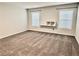 Neutral bedroom features built-in storage and two windows at 626 Discovery Ct, Acworth, GA 30102