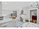 Modern kitchen featuring white countertops, stainless steel appliances, and a breakfast bar at 7750 Landowne Dr, Atlanta, GA 30350