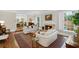Inviting living room with fireplace, hardwood floors, and elegant decor at 7750 Landowne Dr, Atlanta, GA 30350