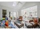 Cozy sunroom with comfortable seating, a skylight, and views of the garden at 7750 Landowne Dr, Atlanta, GA 30350