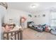 Charming bedroom with soft colors and creative decor creates a cozy and inviting space at 1388 Ben Park Way, Grayson, GA 30017