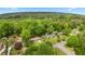 Aerial view of the neighborhood showcasing lush green trees and well-maintained lawns at 4781 Lincoln Ne Dr, Kennesaw, GA 30144