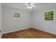 Bedroom featuring modern ceiling fan and dual windows at 4781 Lincoln Ne Dr, Kennesaw, GA 30144