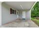 Covered carport with access to a back door entrance, showcasing a practical outdoor space at 4781 Lincoln Ne Dr, Kennesaw, GA 30144