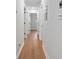 Hallway with wood floors and access to multiple rooms at 4781 Lincoln Ne Dr, Kennesaw, GA 30144