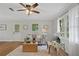 Bright living room featuring a large window, hardwood floors and neutral paint at 4781 Lincoln Ne Dr, Kennesaw, GA 30144