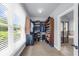 Spacious walk-in closet filled with custom shelves and organizers at 1156 Whisper Cove Dr, Buford, GA 30518