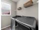 Bright laundry room with modern washer and dryer at 1156 Whisper Cove Dr, Buford, GA 30518