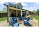 Large brick patio includes an outdoor kitchen, bar and plenty of room for entertaining at 1156 Whisper Cove Dr, Buford, GA 30518