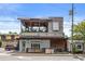 Multi-story building features an upscale burger restaurant with outdoor seating on a covered patio at 1975 Flying Scotsman Dr # 18, Kennesaw, GA 30144