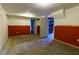 Spacious basement with potential for customization, featuring painted walls and ample room for storage or recreation at 3844 Davis St, Suwanee, GA 30024