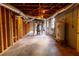 Exposed basement ceiling showing duct work, and utilities, offering space and potential for future renovation at 3844 Davis St, Suwanee, GA 30024