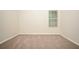Neat bedroom with neutral colors and carpet, lots of light at 4530 Talon Way, Douglasville, GA 30135