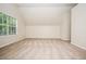 Large bonus room with natural light and neutral colors for versatility at 4530 Talon Way, Douglasville, GA 30135
