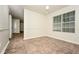 Dining room features tile flooring, neutral walls, and a large window at 4530 Talon Way, Douglasville, GA 30135