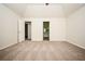 Large main bedroom with vaulted ceilings and neutral carpeting at 4530 Talon Way, Douglasville, GA 30135