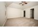 Spacious main bedroom featuring vaulted ceilings and plush carpeting at 4530 Talon Way, Douglasville, GA 30135