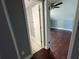 An ensuite bathroom off the bedroom features a tiled floor and a bright, clean space ready for its new owners at 5191 Nw Emory Nw St, Covington, GA 30014
